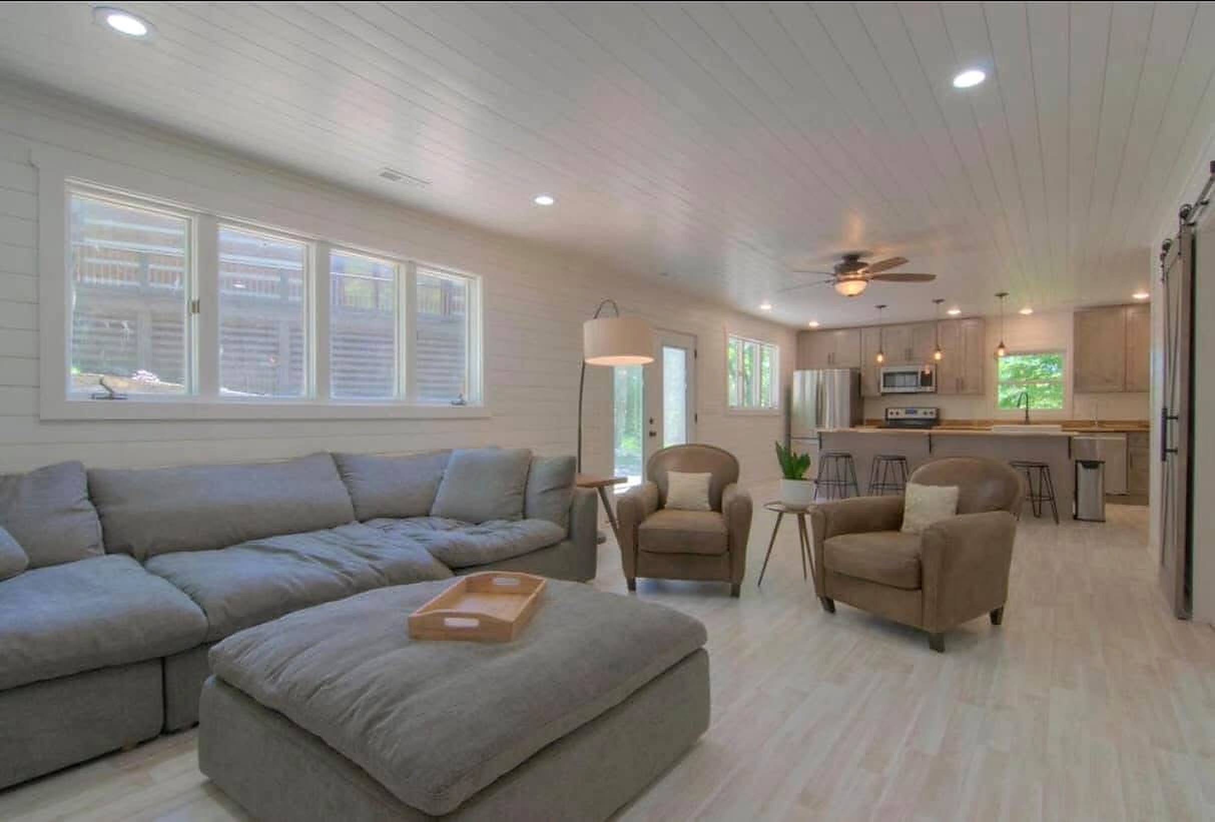 Actual remodeled kitchen with wood island and pendant lighting