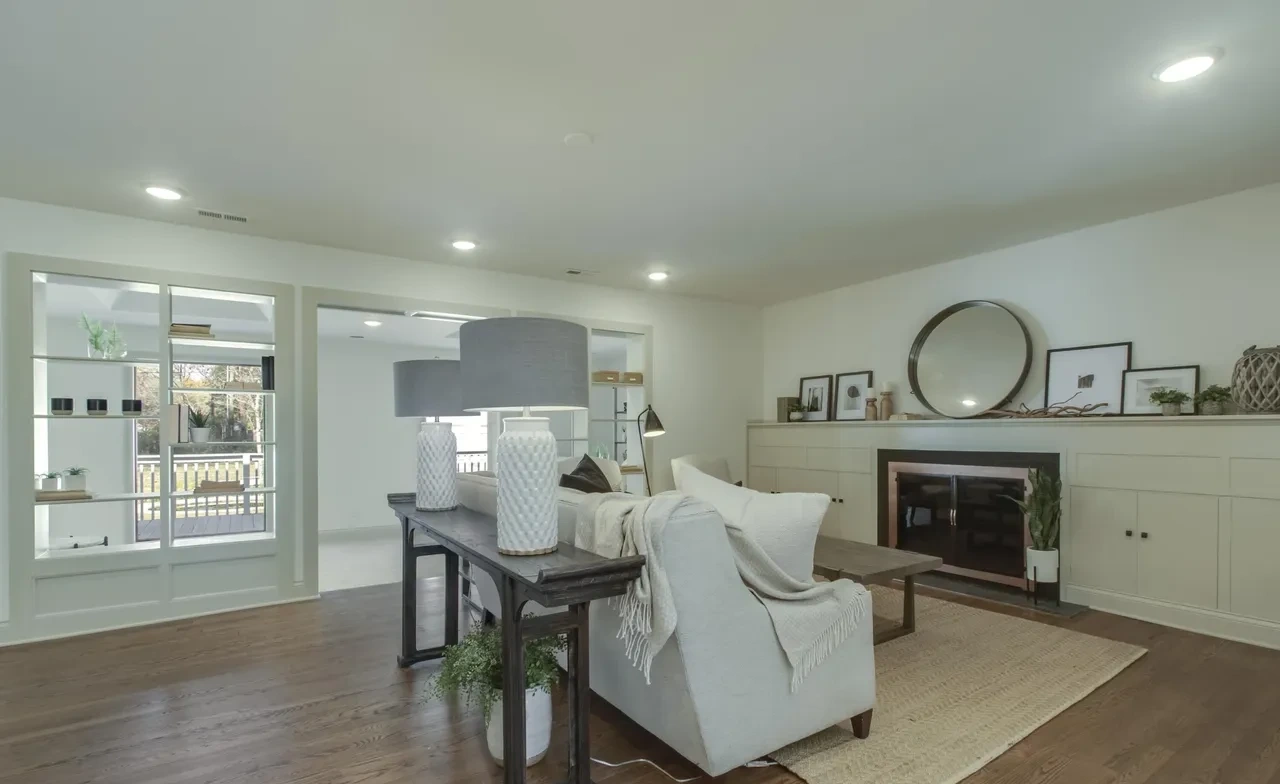 Living room with fireplace and wood floors