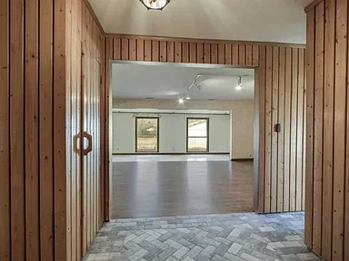 Entry and living area before renovation