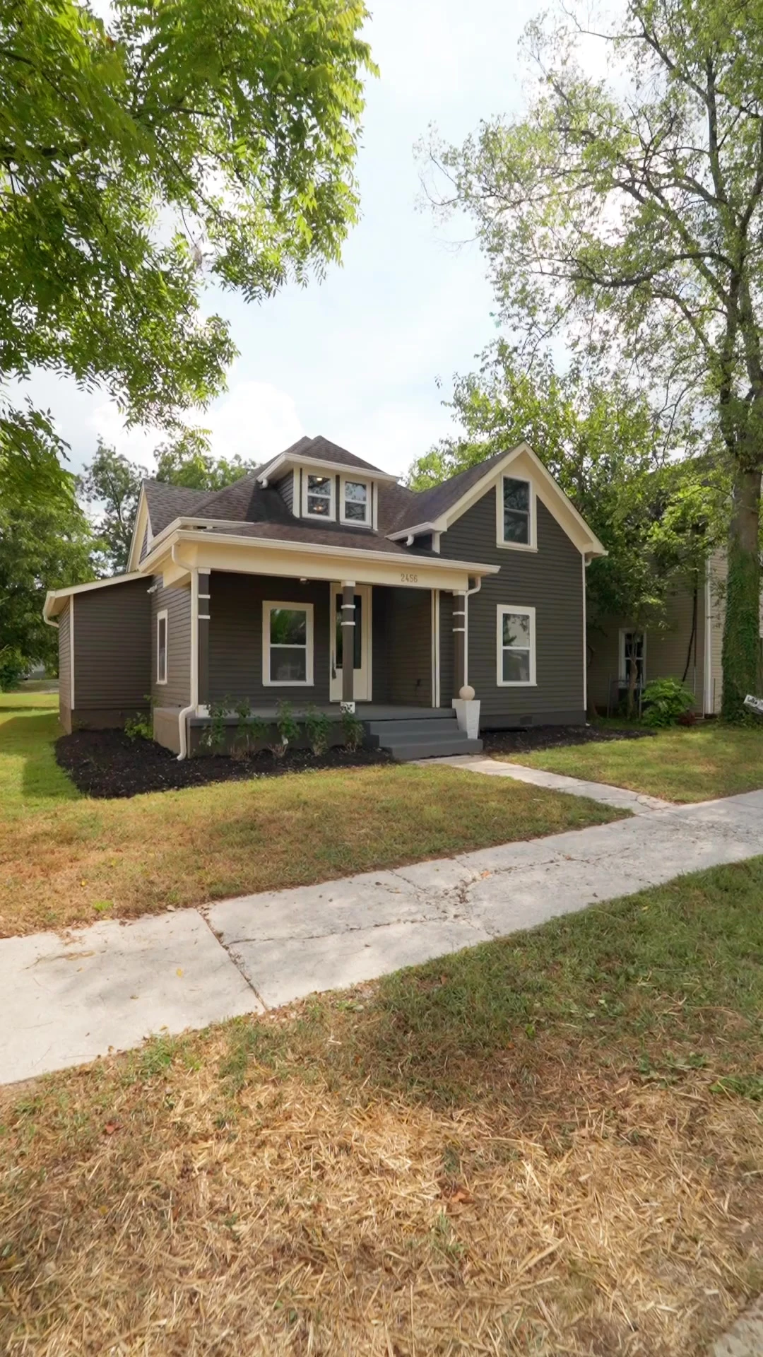 Front porch and exterior of 2456 Woodbine Avenue